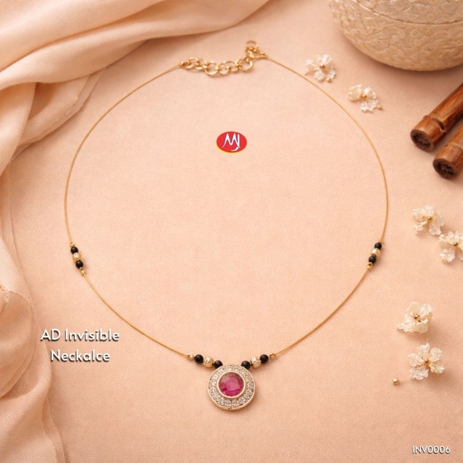 Gold Plated AD Invisible Mangalsutra with Gulabi Ratna pink gemstone pendant, American Diamond detailing, anti-tarnish invisible wire, and traditional black bead accents.